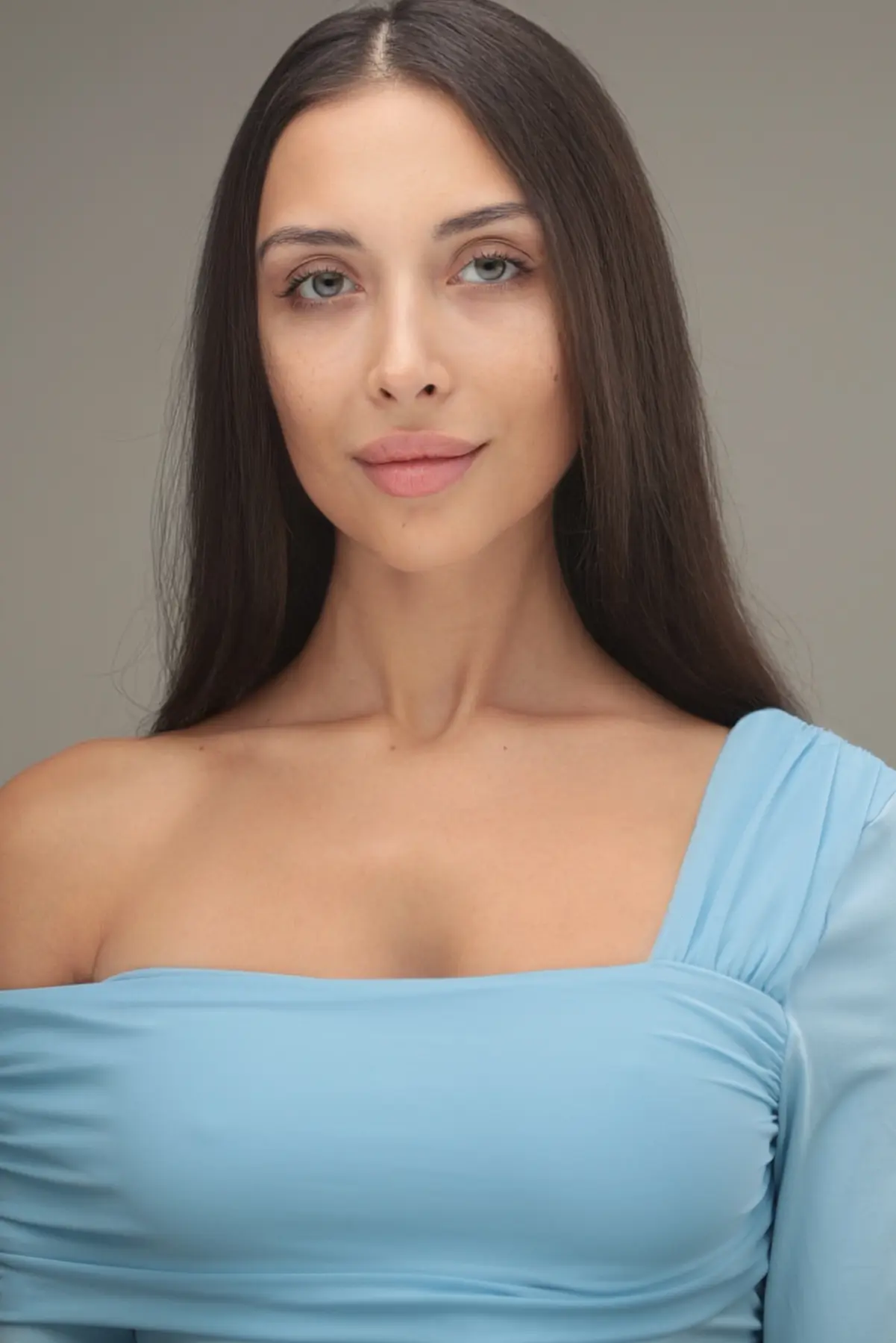 Julia Mindar beauty portrait in a blue top