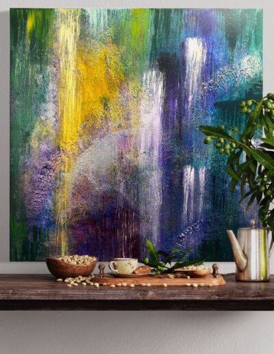 A hanging colorful abstract painting compliments the interior design