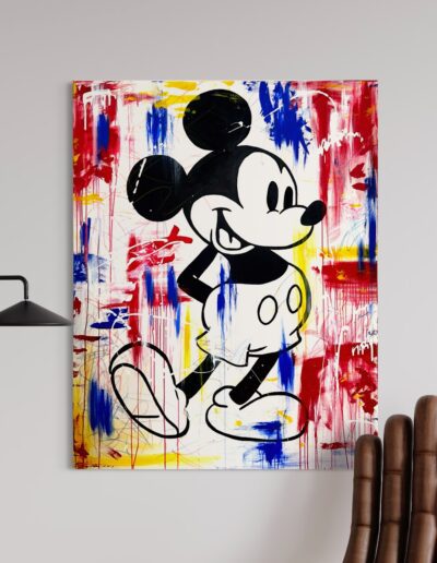 Iconic Mickey Mouse artwork featuring vibrant yellow, blue, and red hues, adding a touch of whimsy to contemporary spaces.